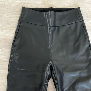 Black leather pull on leggings with side ankle zippers